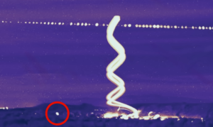 Blue orb streaks above the Triangle during the rocket launch.