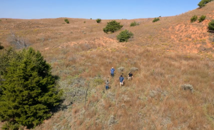 Josh Gates searches a remote hillside for the Dalton Gang's legendary hideout.